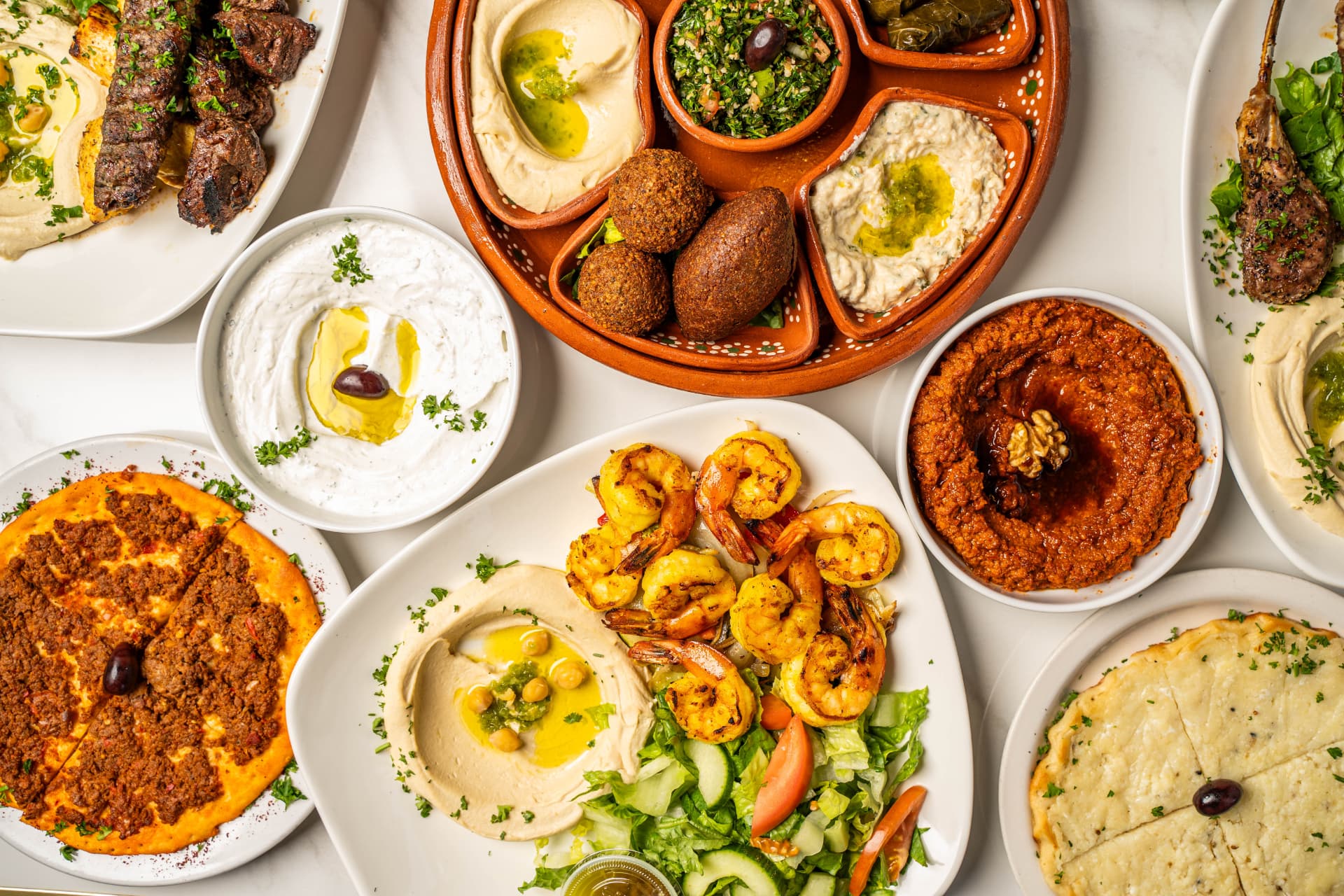 Safeiha, muhammara, labneh and shrimp hummus